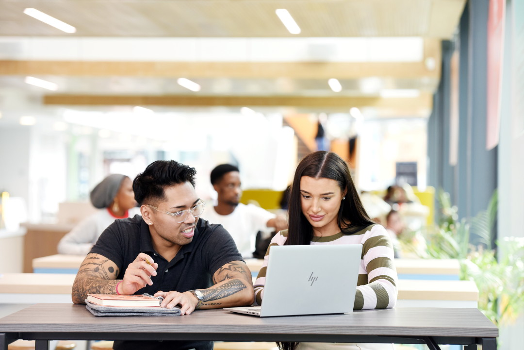students on laptop and ipad in SLB and Library